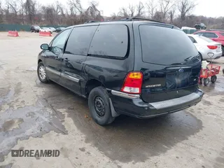 1999 Ford Windstar SE with VIN 2FMDA5243XBC41132, listed as a IAAI auction lot 41575559 with 240,497 mi miles and . Bid and sale history available at carsss.com. Image 3.