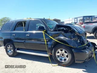 2005 Cadillac Escalade z VIN 1GYEK63N75R134012, wystawiony jako IAAI lot #41821485 z przebiegiem 165 655 mil mil oraz . Historia ofert i sprzedaży dostępna na DreamBid. Obrazek 12.