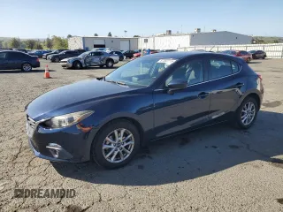 2015 Mazda 3 i Touring with VIN JM1BM1L7XF1244995, listed as a Copart auction lot 57082215 with 133,906 mi miles and Salvage title. Bid and sale history available at DreamBid. Image 1.