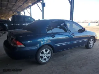 2004 Mitsubishi Lancer LS with VIN JA3AJ36E34U021640, listed as a Copart auction lot 72087834 with 123,951 mi miles and Salvage Title. Bid and sale history available at carsss.com. Image 3.