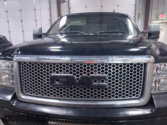 2010 GMC Sierra 1500 Denali z VIN 3GTRKXE20AG272226, wystawiony jako IAAI lot #41958283 z przebiegiem 244 627 mil mil oraz . Historia ofert i sprzedaży dostępna na DreamBid. Obrazek 12.