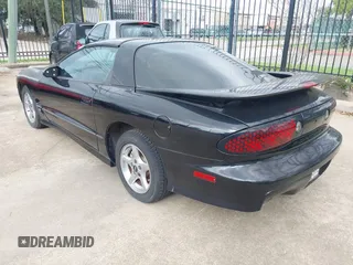 2000 Pontiac Firebird Formula z VIN 2G2FV22G1Y2104657, wystawiony jako IAAI lot #41510589 z przebiegiem Nie podano mil oraz . Historia ofert i sprzedaży dostępna na DreamBid. Obrazek 3.