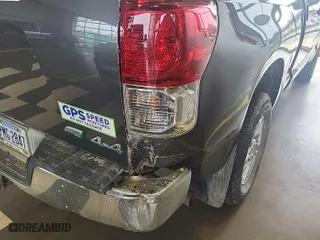2013 Toyota Tundra 4WD Truck with VIN 5TFUW5F17DX272636, listed as a IAAI auction lot 42143265 with 297,828 mi miles. Bid and sale history available at carsss.com. Image 1.