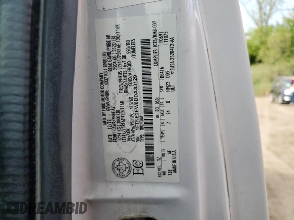 2013 Ford Econoline Cargo Commercial with VIN 1FTNE2EW6DDA33129, listed as a Copart auction lot 57098145 with 125,302 mi miles and Clean title. Bid and sale history available at DreamBid. Image 13.