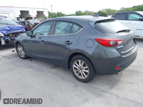 2015 Mazda 3 i Touring with VIN JM1BM1L79F1218498, listed as a IAAI auction lot 41876820 with 87,602 mi miles and . Bid and sale history available at carsss.com. Image 3.