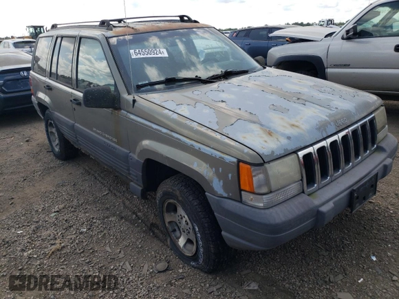 1997 Jeep Grand Cherokee Laredo z VIN 1J4GZ58S4VC502596, wystawiony jako Copart lot #88255865 z przebiegiem Nie podano mil oraz Nie do naprawy • Non repairable. Historia ofert i sprzedaży dostępna na DreamBid. Obrazek 4.