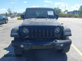 2021 Jeep Wrangler Unlimited Sport S with VIN 1C4HJXDN4MW669387, listed as a IAAI auction lot 41889814 with 17,333 mi miles and . Bid and sale history available at DreamBid. Image 12.