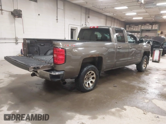 2015 Chevrolet Silverado 1500 LT with VIN 1GCVKREC6FZ183559, listed as a IAAI auction lot 41813921 with 171,304 mi miles and . Bid and sale history available at DreamBid. Image 4.