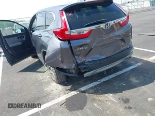 2017 Honda CR-V EX-L with VIN 7FARW1H89HE002384, listed as a IAAI auction lot 41908640 with 131,229 mi miles. Bid and sale history available at carsss.com. Image 6.
