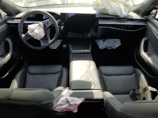 2023 Tesla Model S Plaid z VIN 5YJSA1E61PF528022, wystawiony jako Copart lot #53088135 z przebiegiem Nie podano mil oraz Czysty tytuł • Clean title. Historia ofert i sprzedaży dostępna na DreamBid. Obrazek 8.