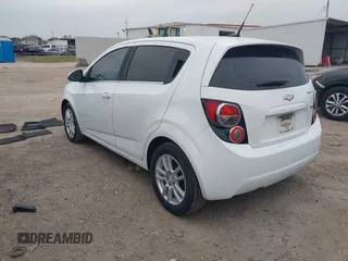 2014 Chevrolet Sonic LT with VIN 1G1JC6SB2E4215465, listed as a IAAI auction lot 41140292 with 93,224 mi miles. Bid and sale history available at carsss.com. Image 3.