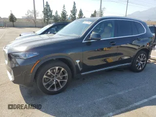 2025 BMW X5 sDrive40i with VIN 5UX13EU05S9W82678, listed as a Copart auction lot 49857255 with 9,901 mi miles and Salvage Title. Bid and sale history available at carsss.com. Image 1.