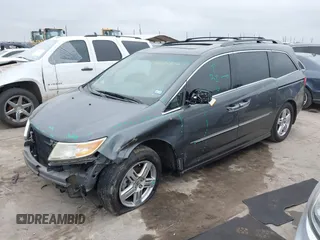 2012 Honda Odyssey Touring with VIN 5FNRL5H96CB138548, listed as a IAAI auction lot 41471856 with 186,284 mi miles and . Bid and sale history available at DreamBid. Image 18.