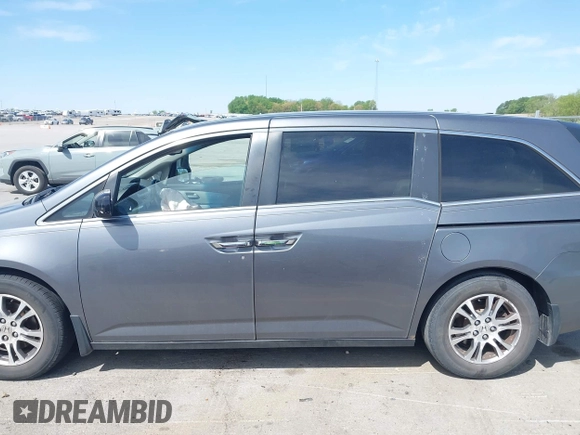 2011 Honda Odyssey EX-L with VIN 5FNRL5H69BB092752, listed as a IAAI auction lot 42245534 with 142,718 mi miles and . Bid and sale history available at DreamBid. Image 14.