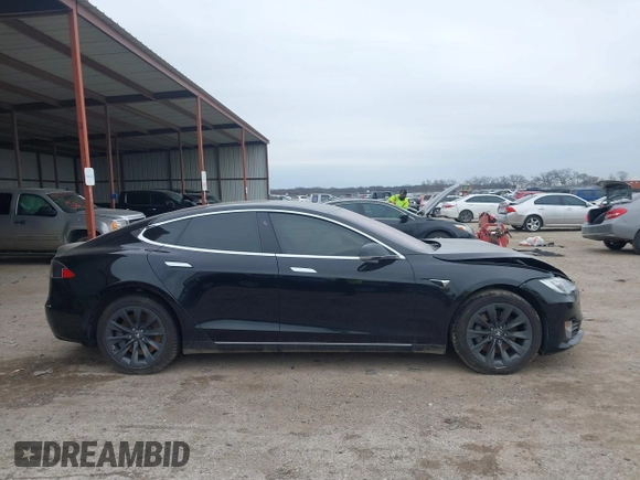 2018 Tesla Model S 75D with VIN 5YJSA1E22JF282828, listed as a IAAI auction lot 41595543 with 72,571 mi miles and . Bid and sale history available at DreamBid. Image 12.