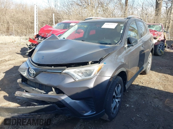 2016 Toyota RAV4 LE with VIN JTMBFREV1GJ085659, listed as a IAAI auction lot 41823575 with 141,657 mi miles. Bid and sale history available at carsss.com. Image 2.