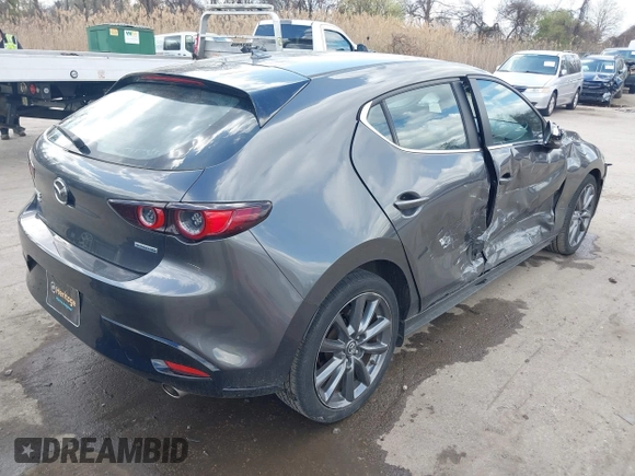 2020 Mazda 3 Preferred with VIN JM1BPBMM1L1169228, listed as a IAAI auction lot 41930452 with 31,351 mi miles and . Bid and sale history available at DreamBid. Image 4.