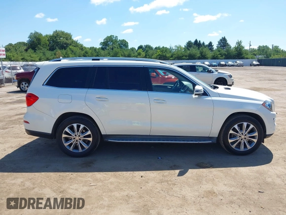 2014 Mercedes-Benz GL 450 with VIN 4JGDF7CE3EA336481, listed as a IAAI auction lot 42647526 with 145,311 mi miles and . Bid and sale history available at DreamBid. Image 13.