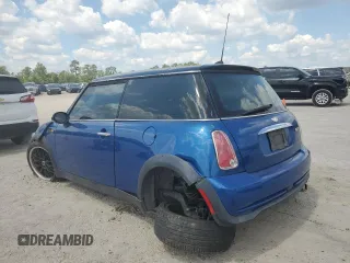 2006 MINI Hardtop with VIN WMWRC33566TK15023, listed as a Copart auction lot 76392014 with Not provided miles and Salvage title. Bid and sale history available at DreamBid. Image 2.