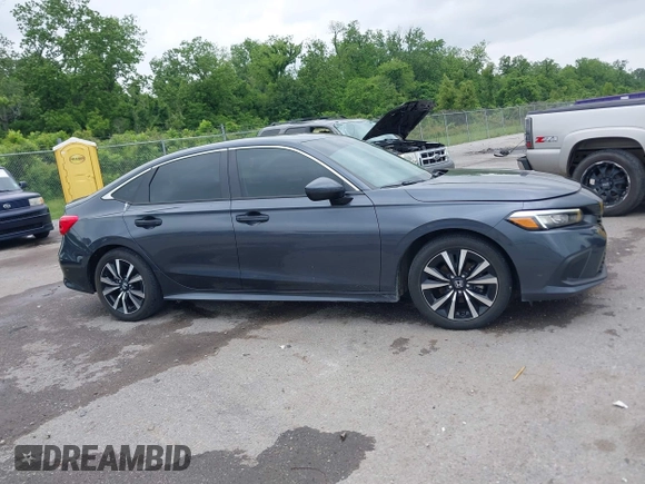 2023 Honda Civic EX with VIN 2HGFE1F73PH312228, listed as a IAAI auction lot 42185408 with 19,339 mi miles and . Bid and sale history available at DreamBid. Image 13.