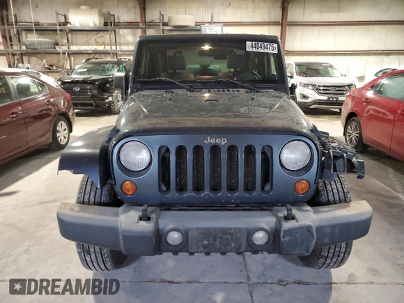 2007 Jeep Wrangler Sahara with VIN 1J4FA54127L127598, listed as a Copart auction lot 44049475 with 222,867 mi miles and Salvage title. Bid and sale history available at DreamBid. Image 5.