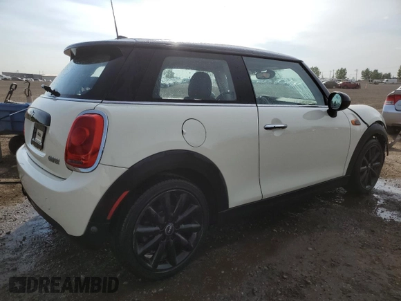 2016 MINI Hardtop with VIN WMWXP5C5XG2D15482, listed as a Copart auction lot 59652125 with 99,066 mi miles and Salvage title. Bid and sale history available at DreamBid. Image 3.