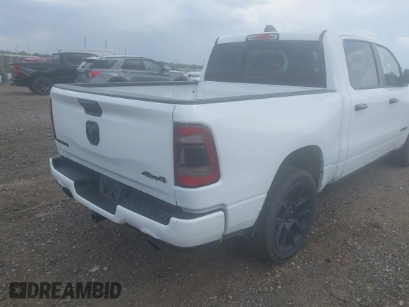 2023 Ram 1500 Laramie with VIN 1C6SRFJT3PN541901, listed as a IAAI auction lot 42156766 with 58,082 mi miles and . Bid and sale history available at DreamBid. Image 4.