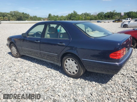 1998 Mercedes-Benz E with VIN WDBJF82F4WX012153, listed as a Copart auction lot 51848665 with 121,867 mi miles and Salvage Title. Bid and sale history available at DreamBid. Image 2.