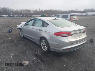 2018 Ford Fusion SE z VIN 3FA6P0HD2JR207865, wystawiony jako IAAI lot #41835895 z przebiegiem 91 069 mil mil oraz . Historia ofert i sprzedaży dostępna na DreamBid. Obrazek 3.