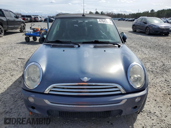 2007 MINI Convertible с VIN WMWRF335X7TG17414, выставлен на аукционе Copart как лот 47640925 с пробегом 149 906 миль миль и Списание • Salvage title. История ставок и продаж доступна на DreamBid. Изображение 5.