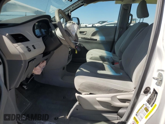 2014 Toyota Sienna L with VIN 5TDZK3DC9ES468417, listed as a Copart auction lot 49970045 with 168,176 mi miles and Salvage Title. Bid and sale history available at carsss.com. Image 7.