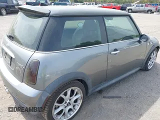 2006 MINI Hardtop S with VIN WMWRE33576TL20826, listed as a IAAI auction lot 42130614 with 160,938 mi miles and . Bid and sale history available at DreamBid. Image 4.