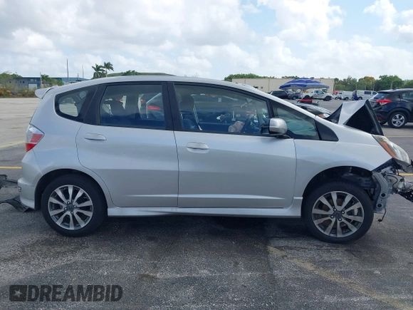 2012 Honda Fit Sport with VIN JHMGE8H5XCC034799, listed as a IAAI auction lot 41957184 with 86,373 mi miles. Bid and sale history available at carsss.com. Image 12.