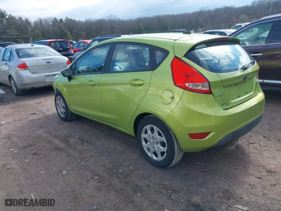 2011 Ford Fiesta SE with VIN 3FADP4EJ2BM113623, listed as a IAAI auction lot 41685229 with 137,954 mi miles. Bid and sale history available at carsss.com. Image 3.