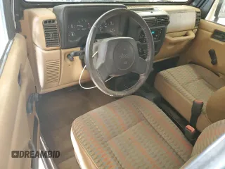 1997 Jeep Wrangler Sport with VIN 1J4FY19S6VP457417, listed as a Copart auction lot 52110535 with 106,129 mi miles and Salvage Title. Bid and sale history available at carsss.com. Image 8.