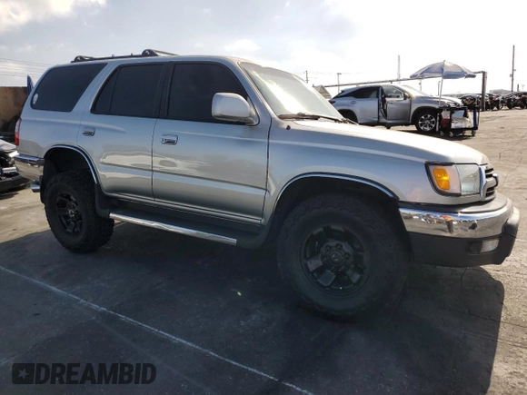 2000 Toyota 4Runner SR5 z VIN JT3GN86R4Y0159902, wystawiony jako Copart lot #57287845 z przebiegiem 174 742 mil mil oraz Szkoda całkowita • Salvage title. Historia ofert i sprzedaży dostępna na DreamBid. Obrazek 4.