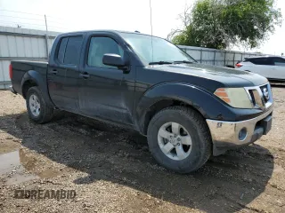 2011 Nissan Frontier SV with VIN 1N6AD0ER6BC451979, listed as a Copart auction lot 54079405 with 222,196 mi miles and Salvage title. Bid and sale history available at DreamBid. Image 4.