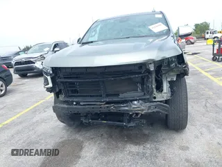 2023 Chevrolet Suburban Premier with VIN 1GNSCFKD2PR377493, listed as a IAAI auction lot 42426988 with 71,365 mi miles and . Bid and sale history available at DreamBid. Image 6.