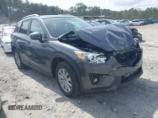 2015 Mazda CX-5 Touring with VIN JM3KE2CY2F0530204, listed as a IAAI auction lot 41788921 with 50,827 mi miles. Bid and sale history available at carsss.com. Image 1.