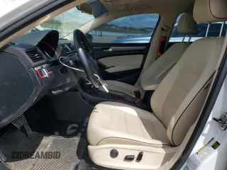 2017 Volkswagen Passat R-Line z VIN 1VWDT7A38HC052171, wystawiony jako Copart lot #55157965 z przebiegiem 82 371 mil mil oraz Szkoda całkowita • Salvage title. Historia ofert i sprzedaży dostępna na DreamBid. Obrazek 7.