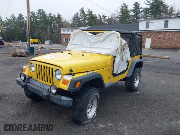 2000 Jeep Wrangler Sport with VIN 1J4FA49S9YP736984, listed as a IAAI auction lot 42055385 with 191,910 mi miles and . Bid and sale history available at DreamBid. Image 12.