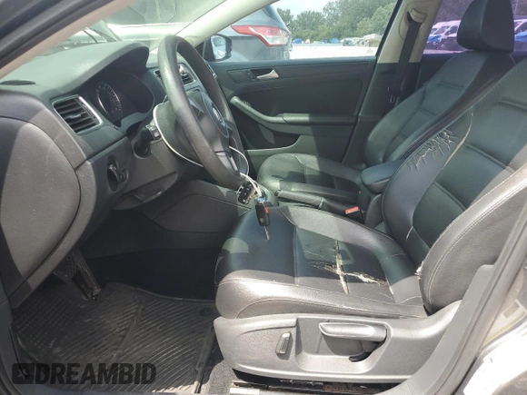 2014 Volkswagen Jetta SE z VIN 3VWD07AJ7EM395250, wystawiony jako Copart lot #65821005 z przebiegiem 155 293 mil mil oraz Czysty tytuł • Clean title. Historia ofert i sprzedaży dostępna na DreamBid. Obrazek 7.