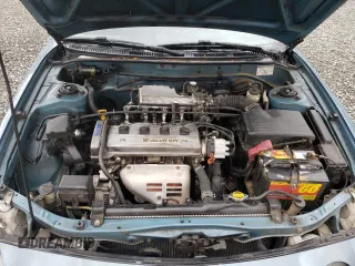 1995 Toyota Celica ST with VIN JT2AT00N7S0047304, listed as a Copart auction lot 77003784 with 423,438 mi miles and Salvage Title. Bid and sale history available at carsss.com. Image 12.