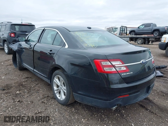 2014 Ford Taurus SEL with VIN 1FAHP2E80EG114996, listed as a IAAI auction lot 41908983 with 136,864 mi miles. Bid and sale history available at carsss.com. Image 3.