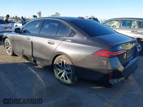 2024 BMW i5 eDrive40 with VIN WBY33FK09RCR42126, listed as a IAAI auction lot 41370577 with 9,601 mi miles and . Bid and sale history available at DreamBid. Image 3.