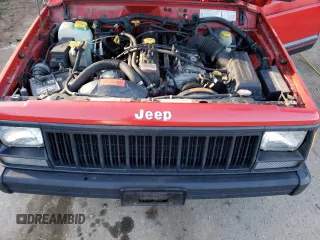 1996 Jeep Cherokee Sport with VIN 1J4FJ68S8TL285995, listed as a Copart auction lot 73333574 with 187,429 mi miles and Salvage Title. Bid and sale history available at carsss.com. Image 12.