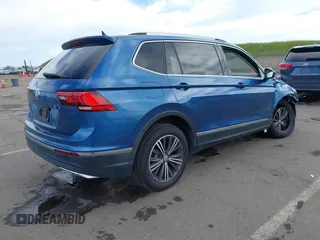 2019 Volkswagen Tiguan SE with VIN 3VV3B7AX2KM064568, listed as a IAAI auction lot 42008754 with 53,132 mi miles and . Bid and sale history available at DreamBid. Image 4.