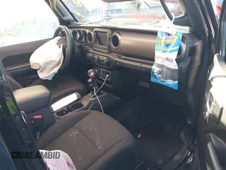 2021 Jeep Wrangler Unlimited Sport S z VIN 1C4HJXDG5MW744101, wystawiony jako IAAI lot #41258885 z przebiegiem Nie podano mil oraz . Historia ofert i sprzedaży dostępna na DreamBid. Obrazek 5.