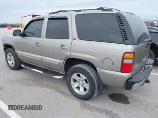 2003 Chevrolet Tahoe LT z VIN 1GNEK13Z53J148280, wystawiony jako IAAI lot #40963535 z przebiegiem 196 726 mil mil oraz . Historia ofert i sprzedaży dostępna na DreamBid. Obrazek 3.