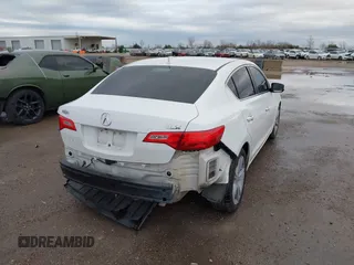 2014 Acura ILX Technology with VIN 19VDE1F77EE009606, listed as a IAAI auction lot 41753813 with 89,945 mi miles and . Bid and sale history available at DreamBid. Image 4.